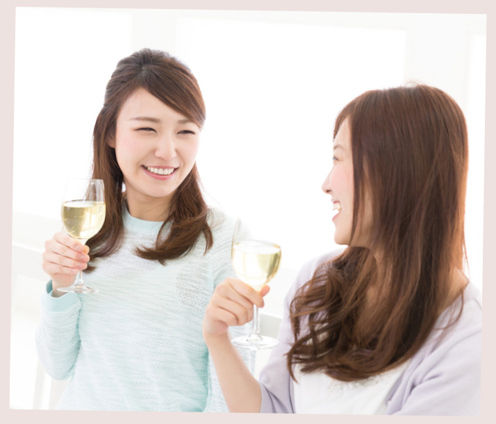 Girls sharing a pre-drink to stop Asian flush